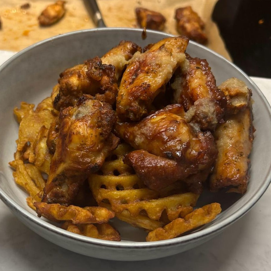 chicken wings with yellow habanero hot sauce